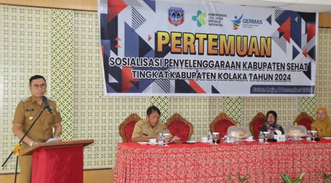 Pj Bupati Kolaka saat memberikan sambutan dalam sosialisasi Penyelenggaraan Kabupaten Sehat